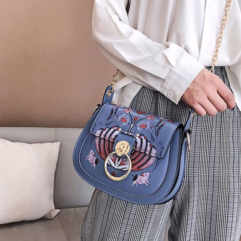 Pu Lock Sarjakuva Satula Crossbody Laukut