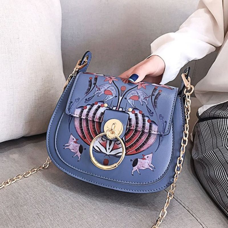 Pu Lock Sarjakuva Satula Crossbody Laukut