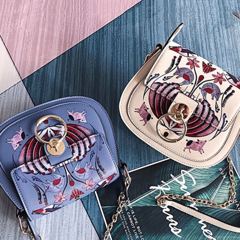 Pu Lock Sarjakuva Satula Crossbody Laukut